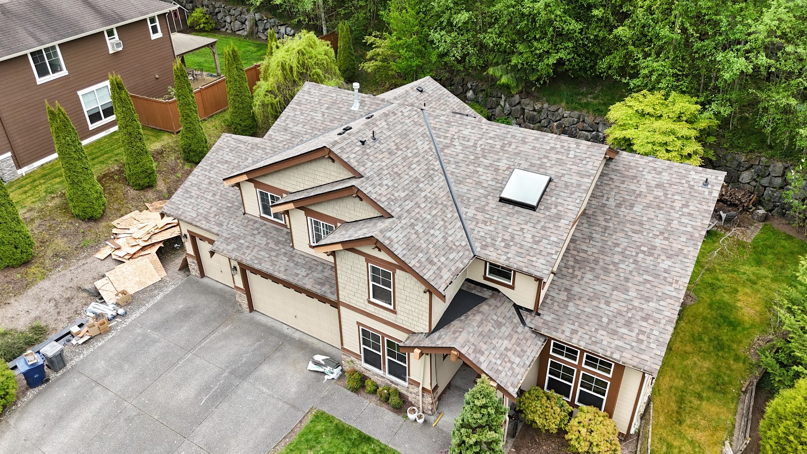 Drone view of a new architectural-shingle roof by Horban Roofing on a craftsman home
